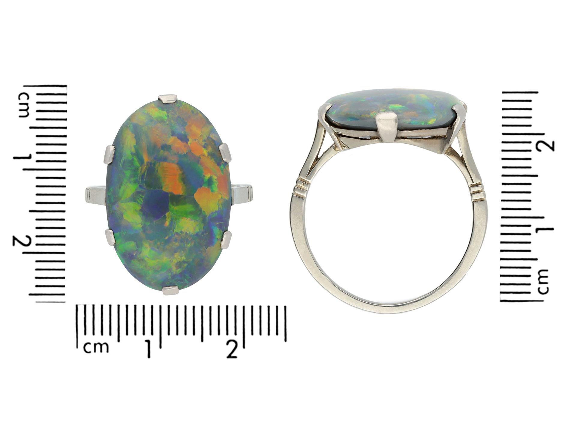 Cabochon Black opal solitaire ring, circa 1930. For Sale
