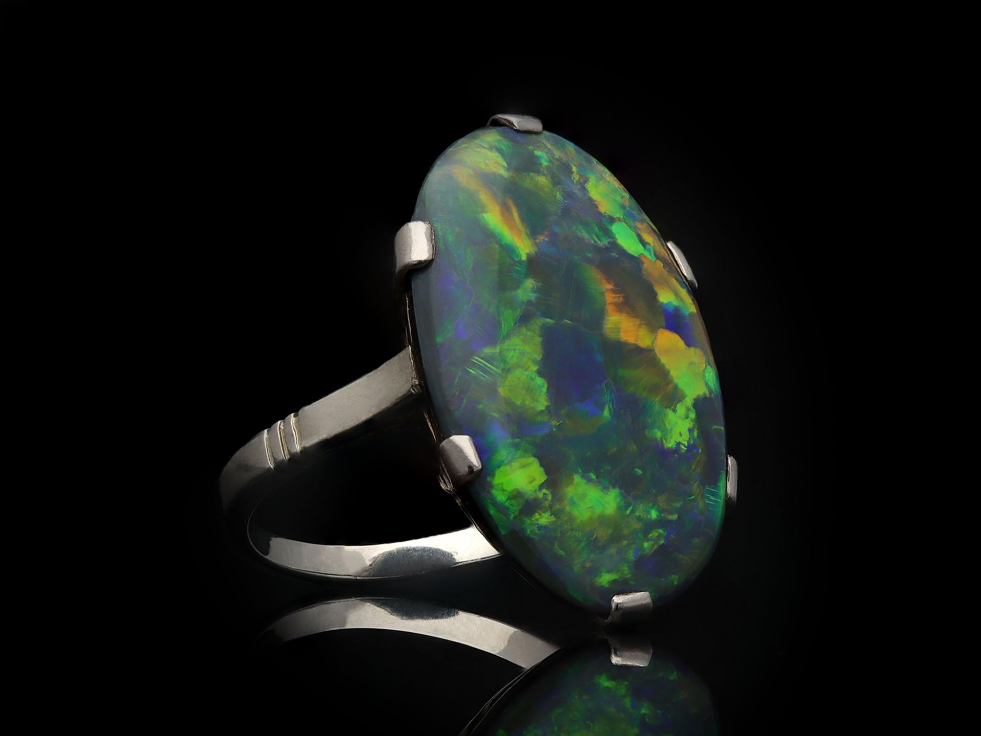 Women's or Men's Black opal solitaire ring, circa 1930. For Sale