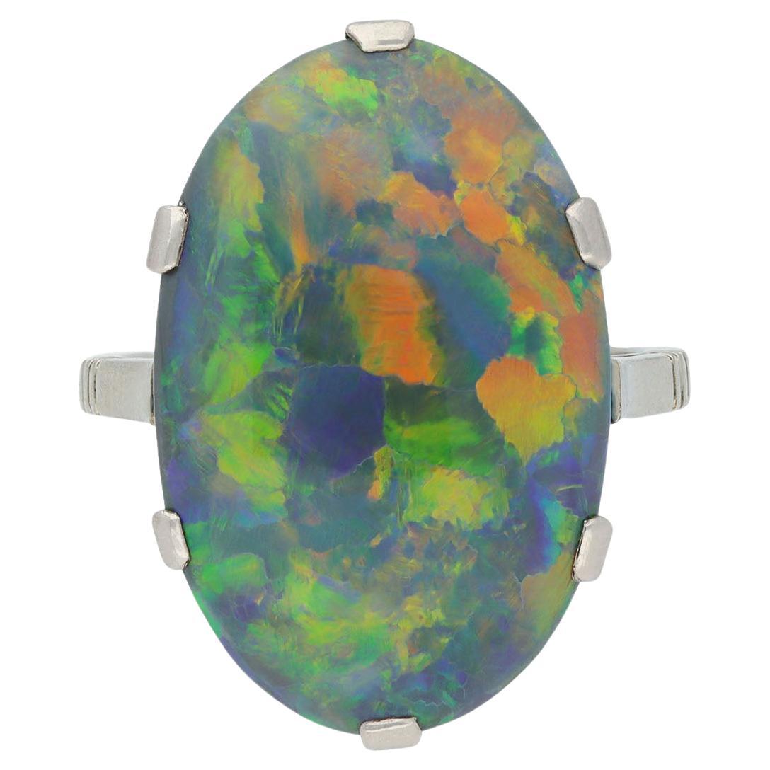Black opal solitaire ring, circa 1930. For Sale