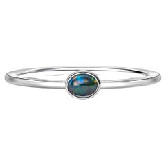 Bague empilable en or 14k avec opale noire.