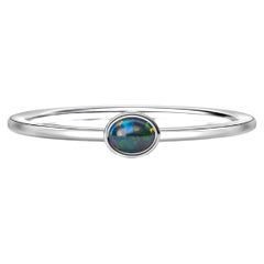 Black opal stackable 14k gold ring.