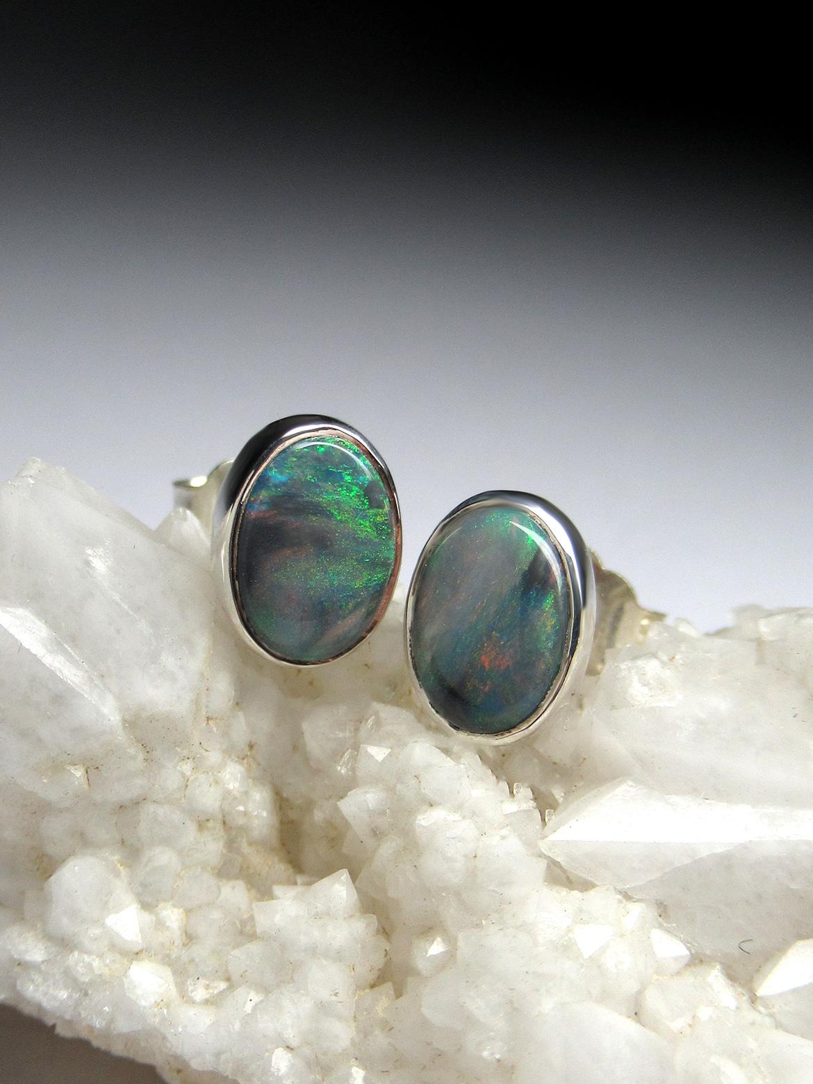 Sterling silver stud earrings with natural Chameleon Black Opal
opal origin - Australia
weight of the earrings - 1.3 grams
stone measurements: 0.20 x 0.31 in / 5 х 8 mm
ref No 2450