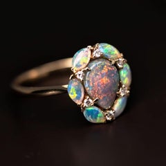 Black Opal Surrounded by Crystal Opals Diamonds 18k Gold Engagement Ring