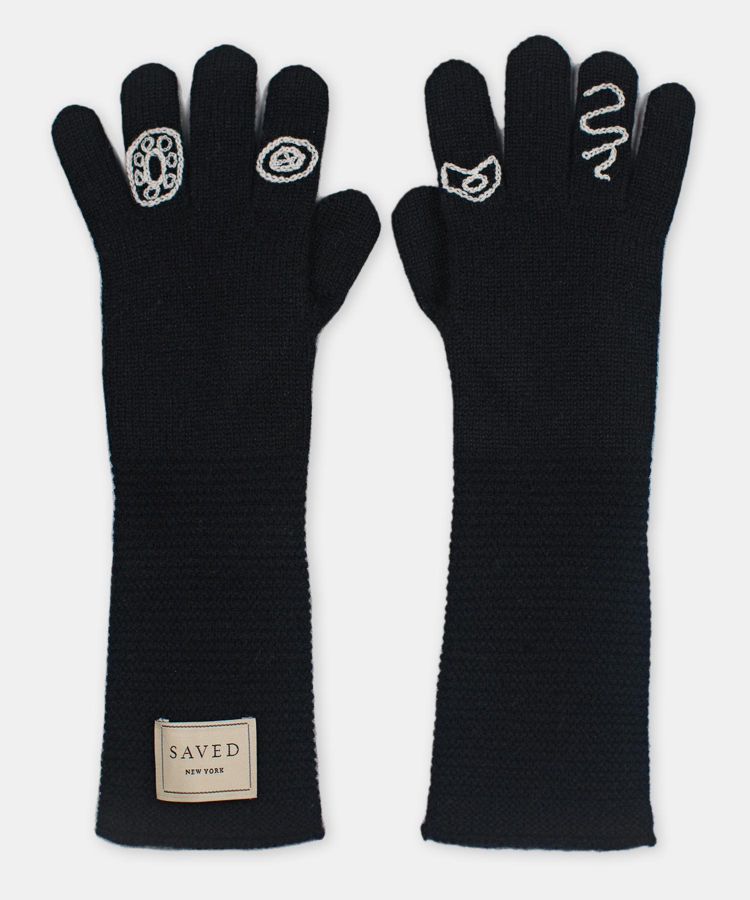 Black opera gloves by Saved, New York

Long, elegant length with hand embroidered details suitable for the theatre. One size. 