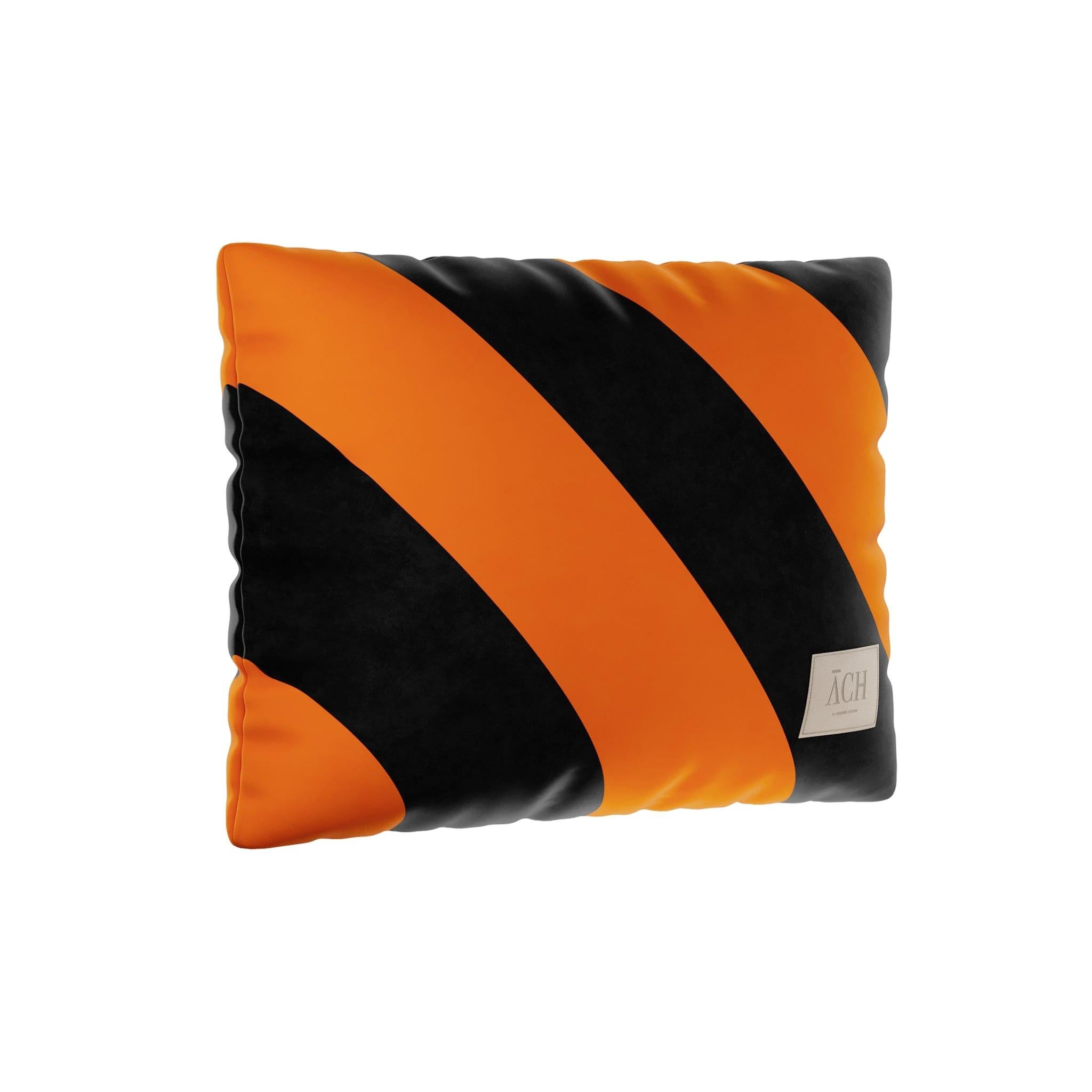 Black Orange Rectangle Pillow is a modern velvet cushion with an eye-catching pattern for a contemporary living room. The throw pillow has a statement color combination of black and orange. Mix the rectangle with solid colors cushions or pop one to