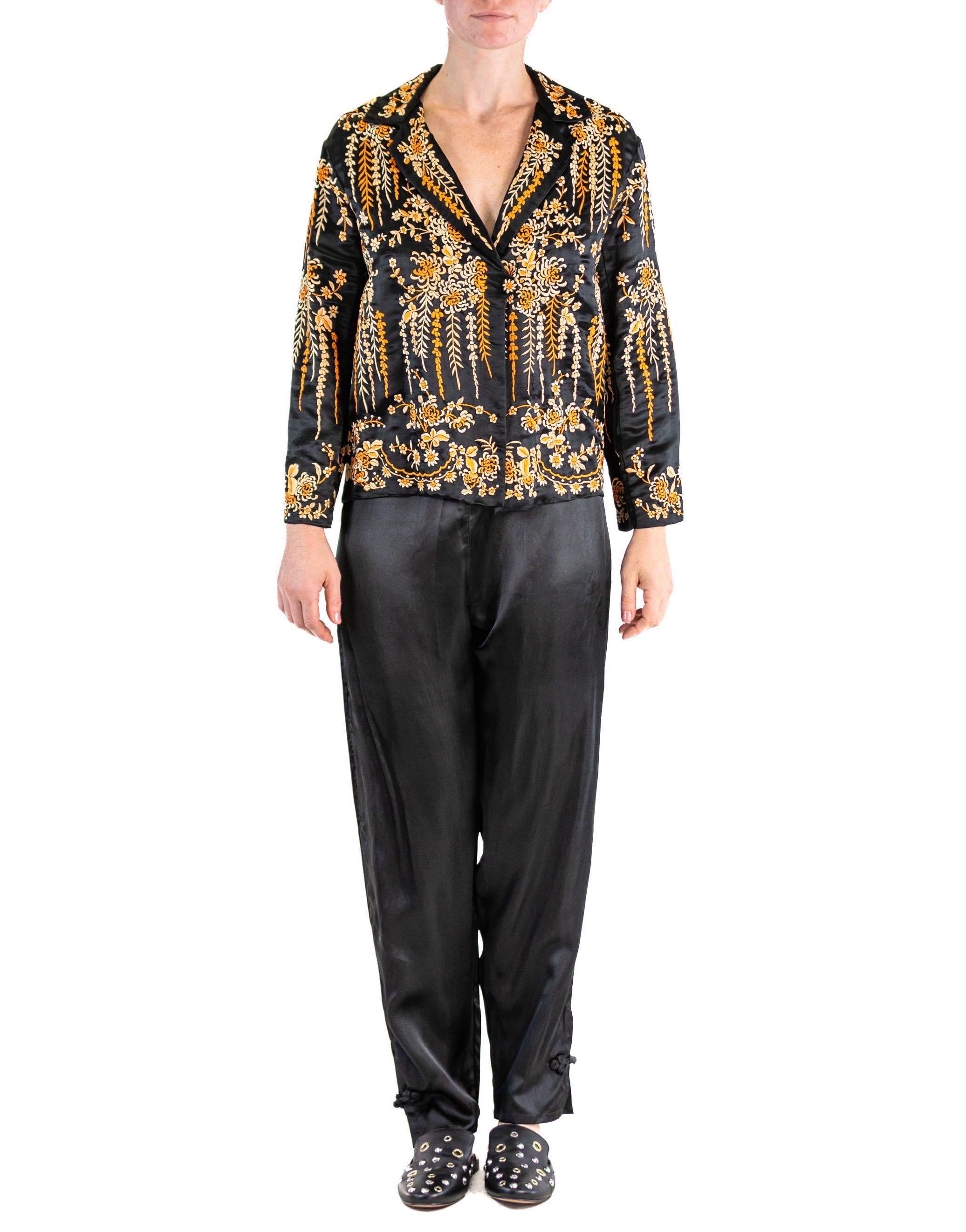 Elastic in the waist. Lot's of stretch.  Black & Orange Silk Satin Hand Embroidered Lounge Pajamas 
