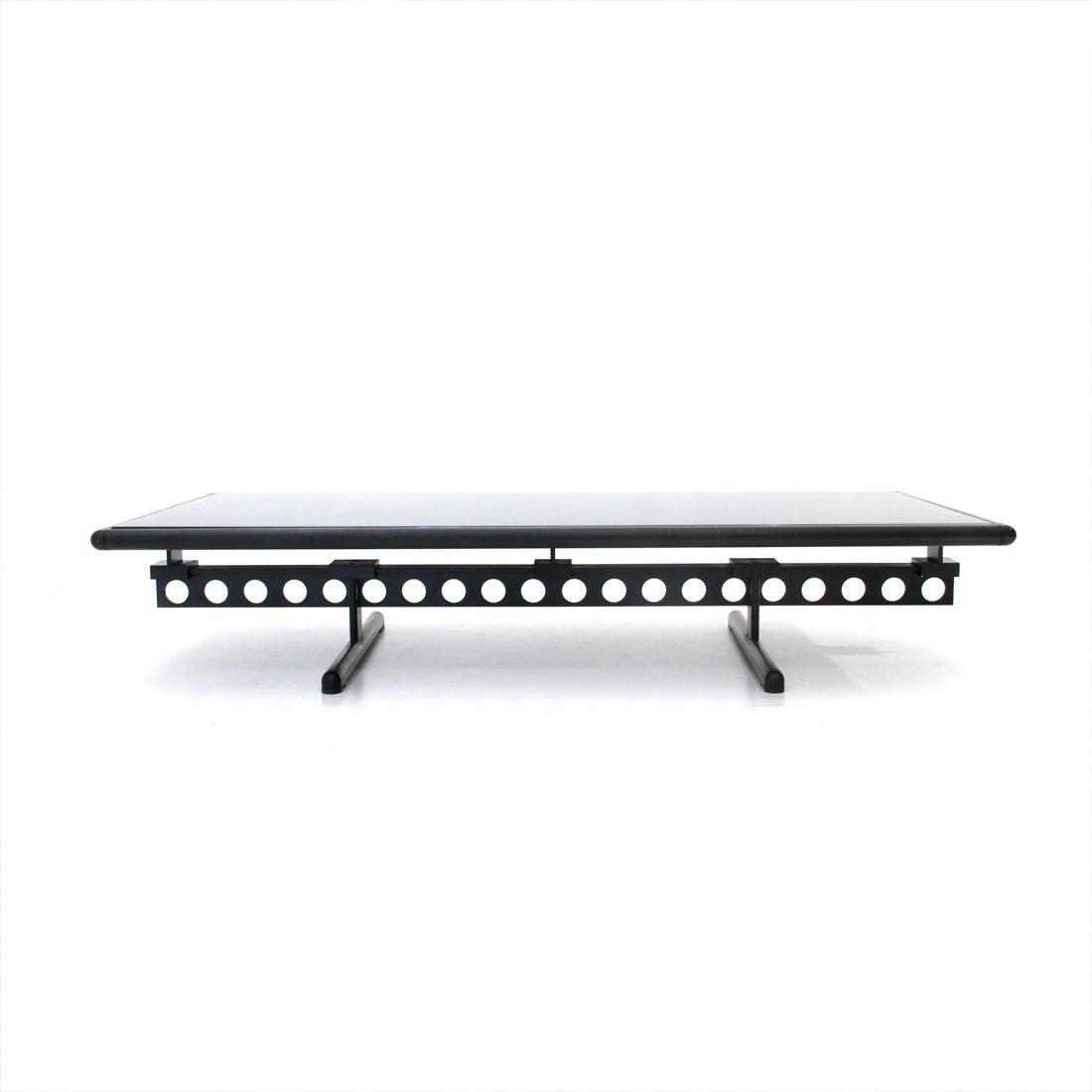 Grosso coffee table produced by Poltrona Frau in the 1980s, designed by Pierluigi Cerri.
Structure in black painted steel section.
Black slate top framed in black painted metal.
Good general conditions, some signs due to normal use over time,