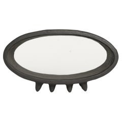Black Oval Ceramic Sculpture with 2 Rows of Small Pointed Feet