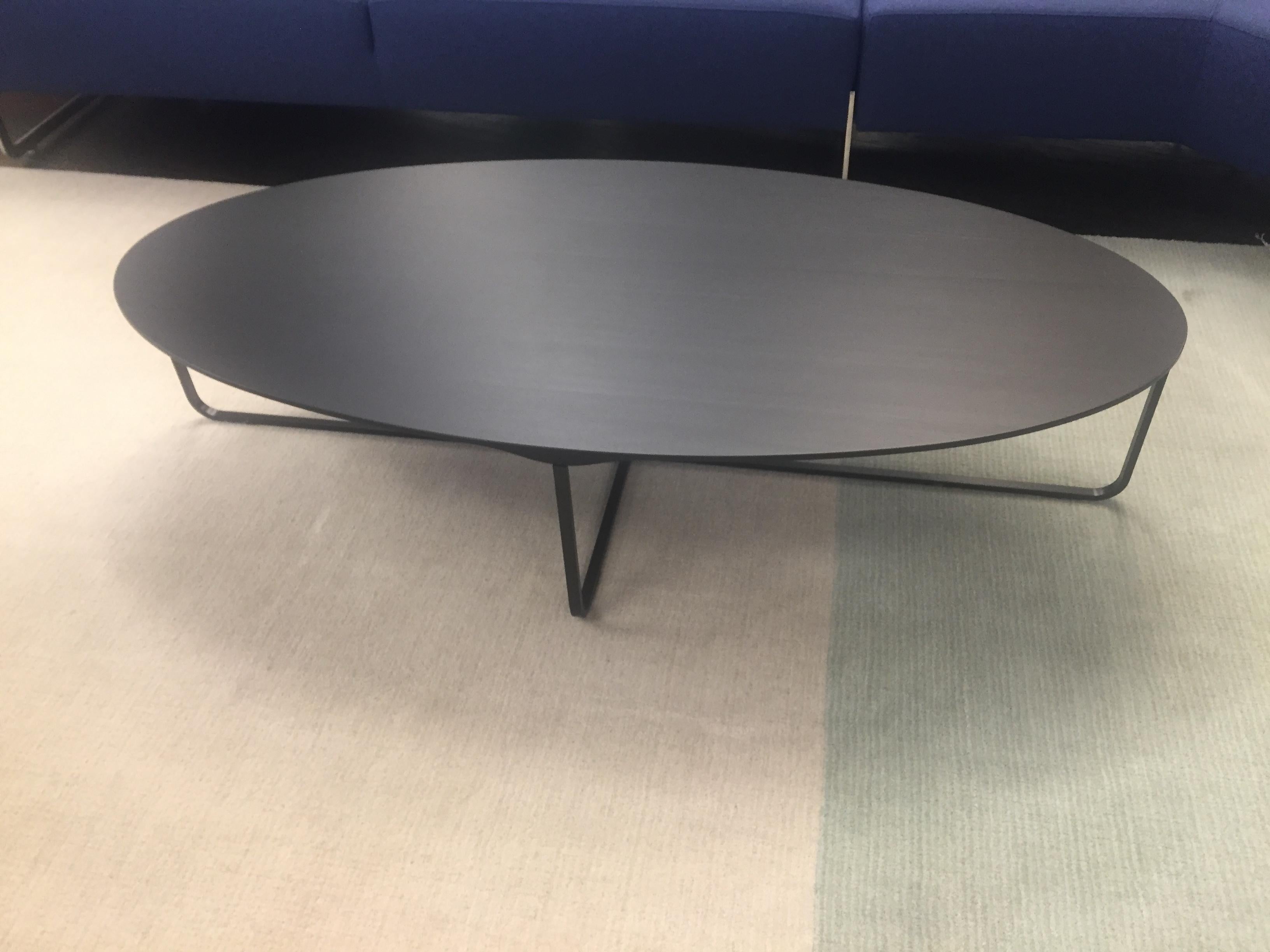 Flint is a whimsical coffee table with a surprising combination of simplicity and an understated natural character. It has a wafer thin top, tapered to the edges, which is sturdily affixed to the delicate base. Flint features a beautiful beveled