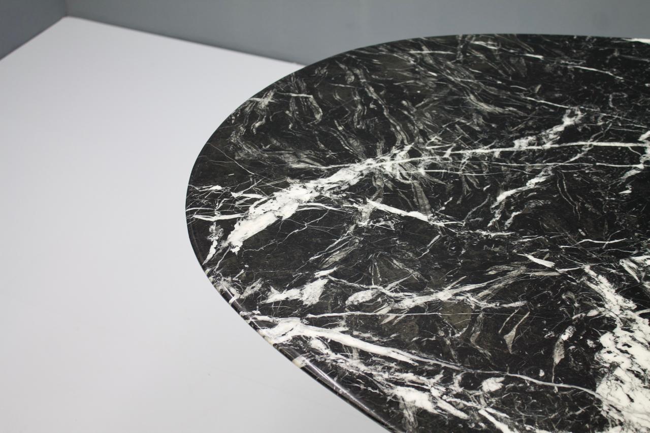 oval black marble dining table