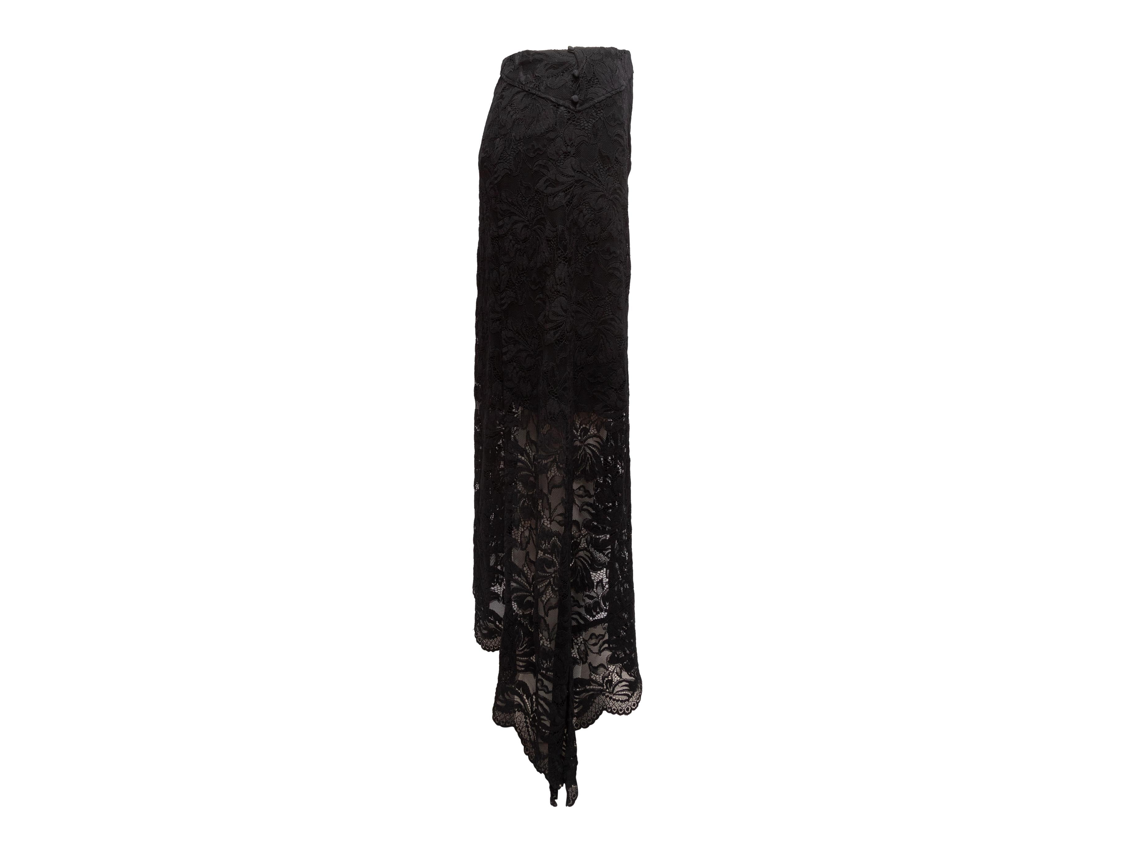 Product Details: Black lace maxi skirt by Paco Rabanne. Button closures at side. Designer size 40. 26