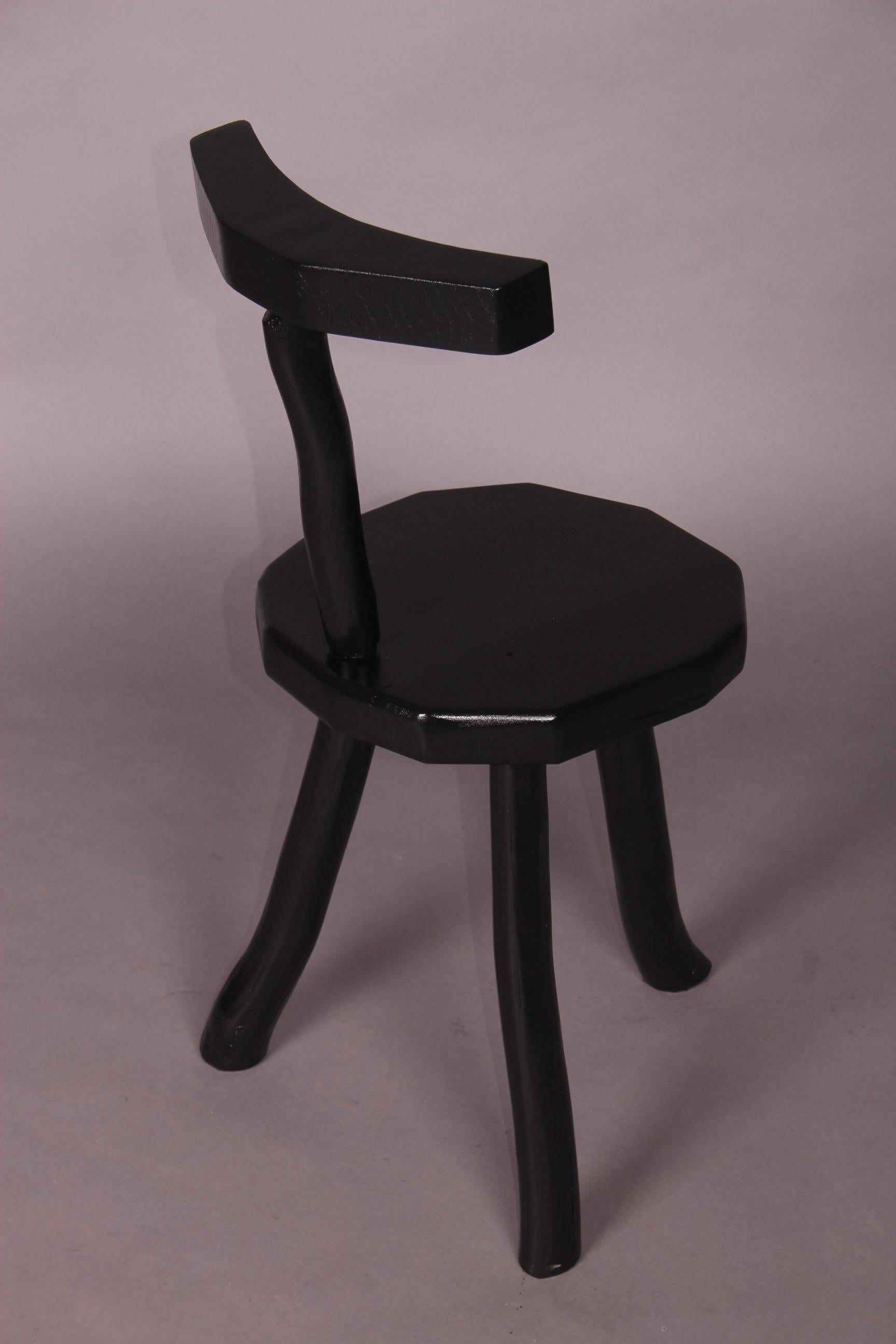 Black painted chair.