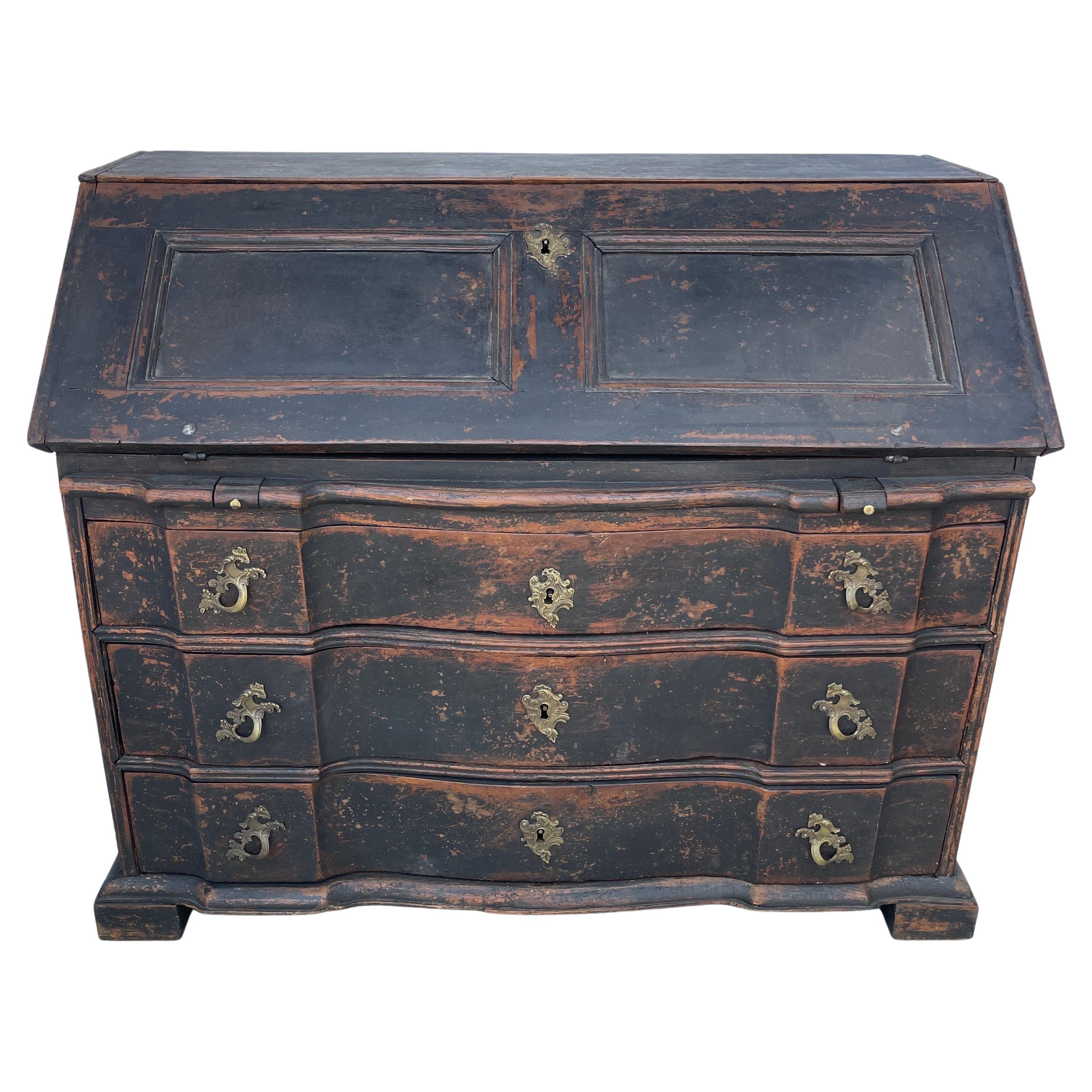 Period Danish Black Painted Gustavian Style Writing Desk Secretary. Refinished in painted black with pull down desk area and multiple drawers that vary in size. The brass hardware elevate this particular piece. Wonderful secretary desk for any