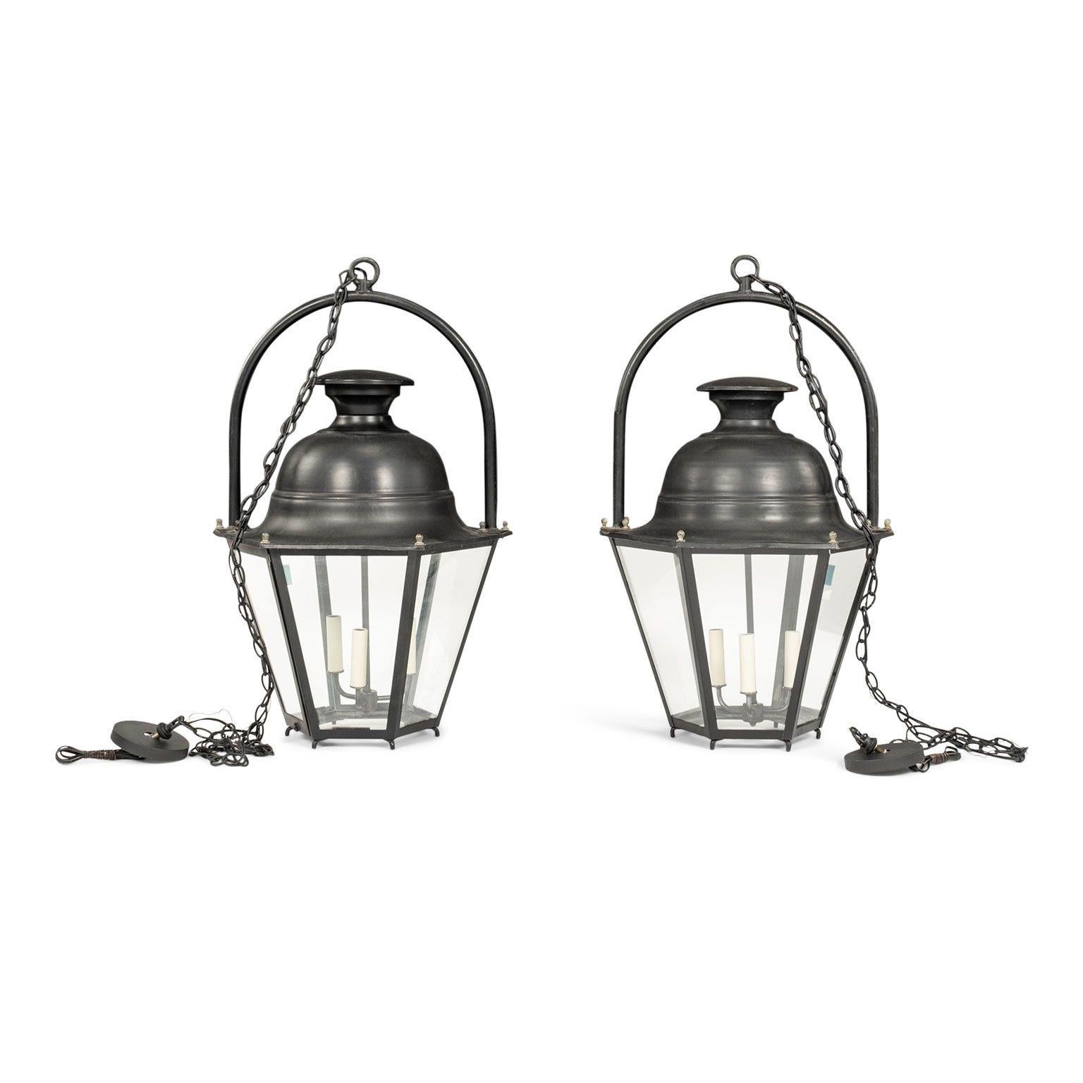 Black-painted hexagonal street lantern from the South of France. Newly wired for use within the USA using UL listed parts. Includes chain and canopy (listed height does not include chain). Two available and sold separately priced $4,800 each.