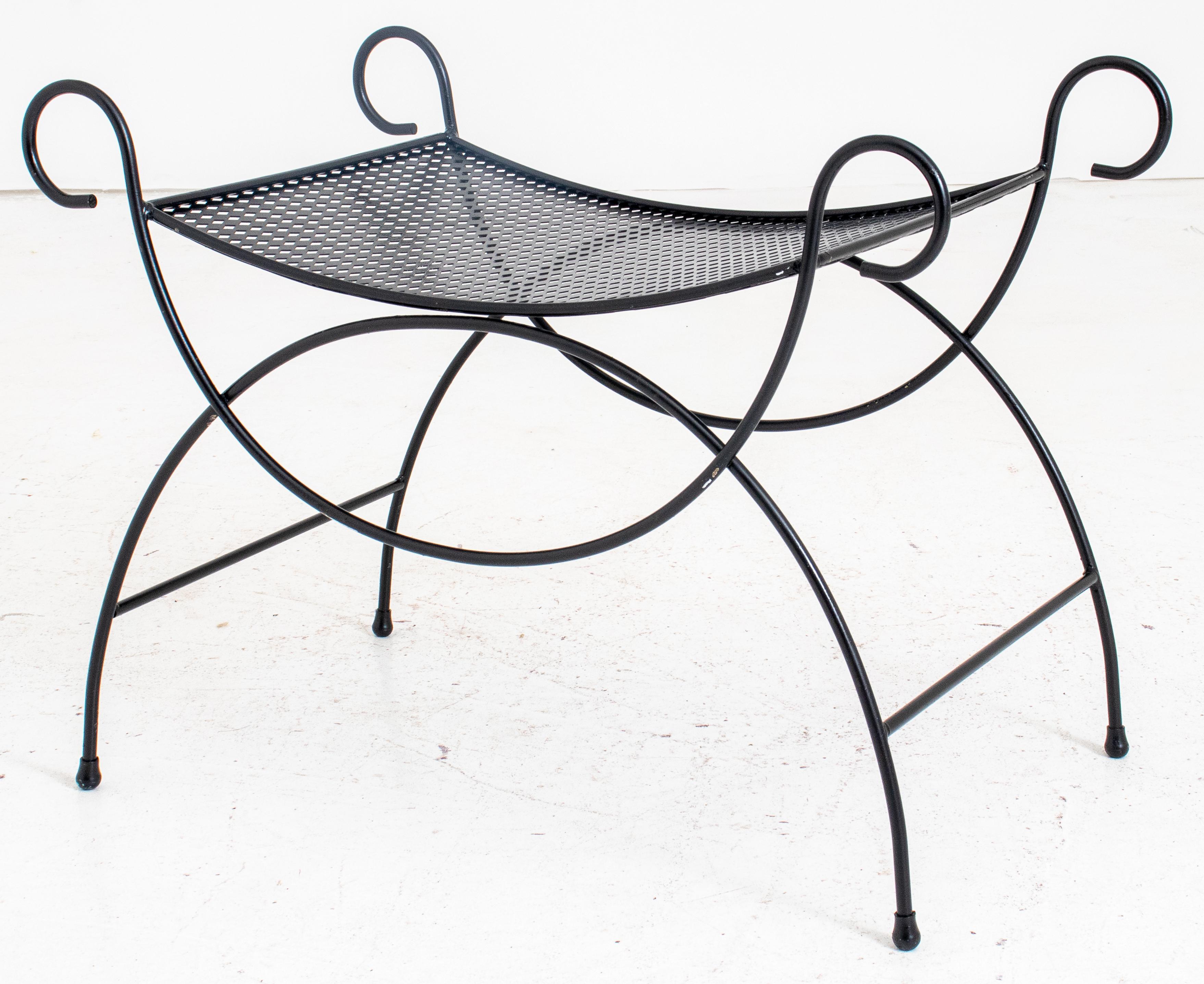 Black painted metal bench, with shaped rectangular pierced seat supported by scrolling arms and legs.

Dealer: S138XX