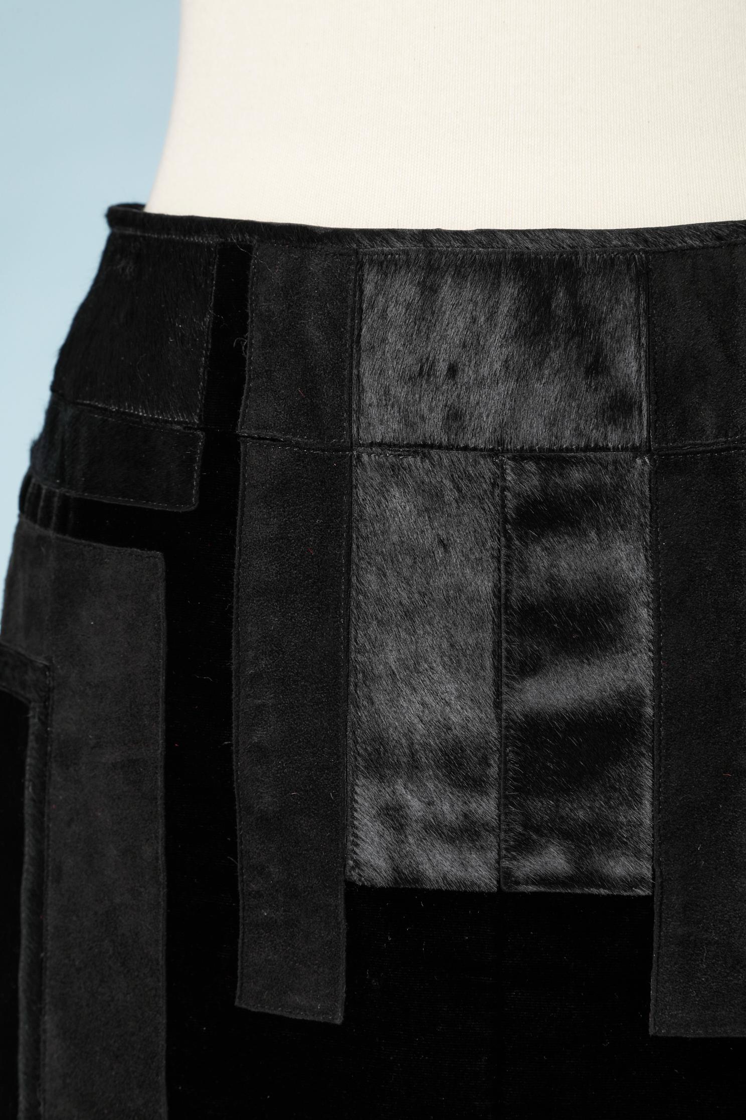 Black patchwork skirt made of suede, leather and velvet ( composition: 82% rayon, 18% silk) 1st leather: sheep 2nd leather ( suede) : calf
Lining: 72% acetate, 28% silk.
Split on the middle front.
SIZE on tag :40 / M ( but hips size is more S ) 
