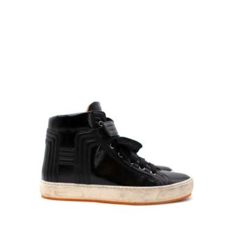 Hermes Black Patent Leather High Tops
 

 - Pebble dash texture patent leather 
 - Leather panel 
 - Lace fastening with velcro strap
 - Nude leather lining 
 

 Materials:
 Leather 
 

 Made in Italy 
 

 9/10 very good condition, with minor signs
