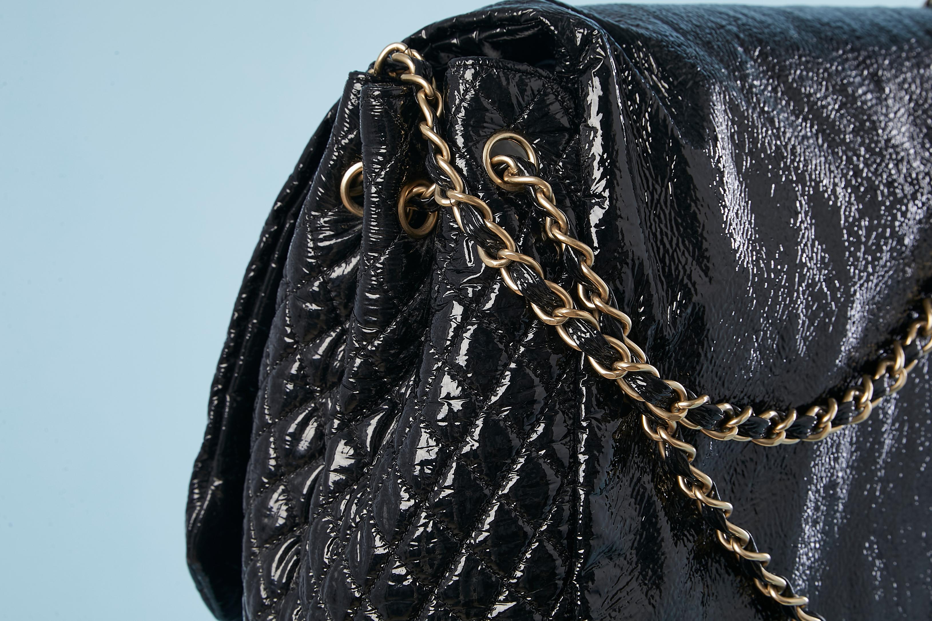 Women's or Men's Black patent leather jumbo shoulder bag with Double C Chanel Numbered