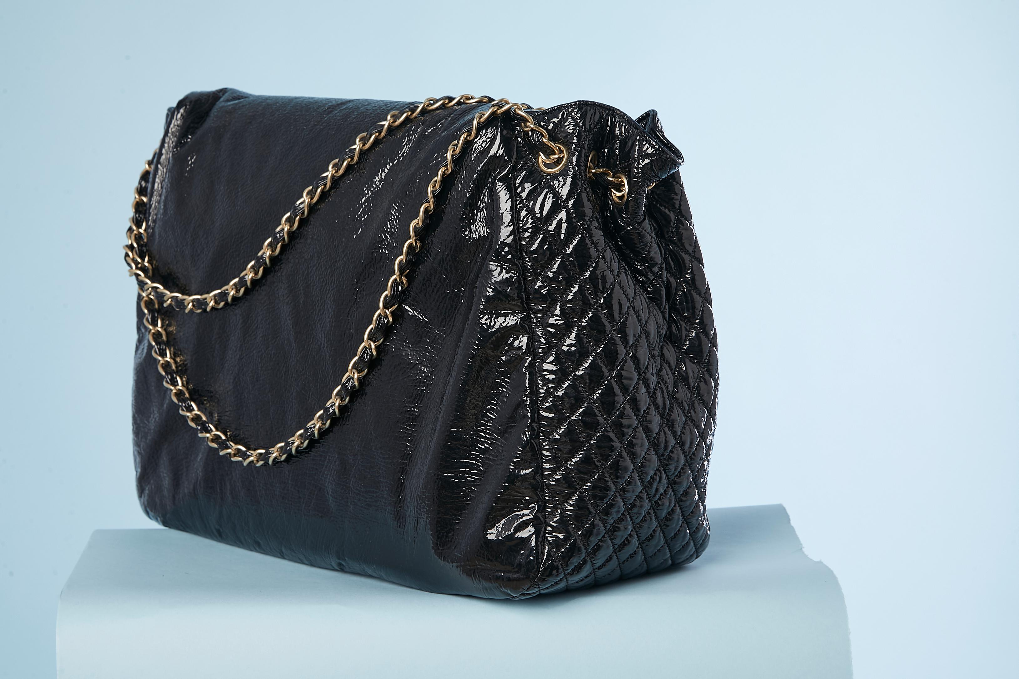 Black patent leather jumbo shoulder bag with Double C Chanel Numbered 1