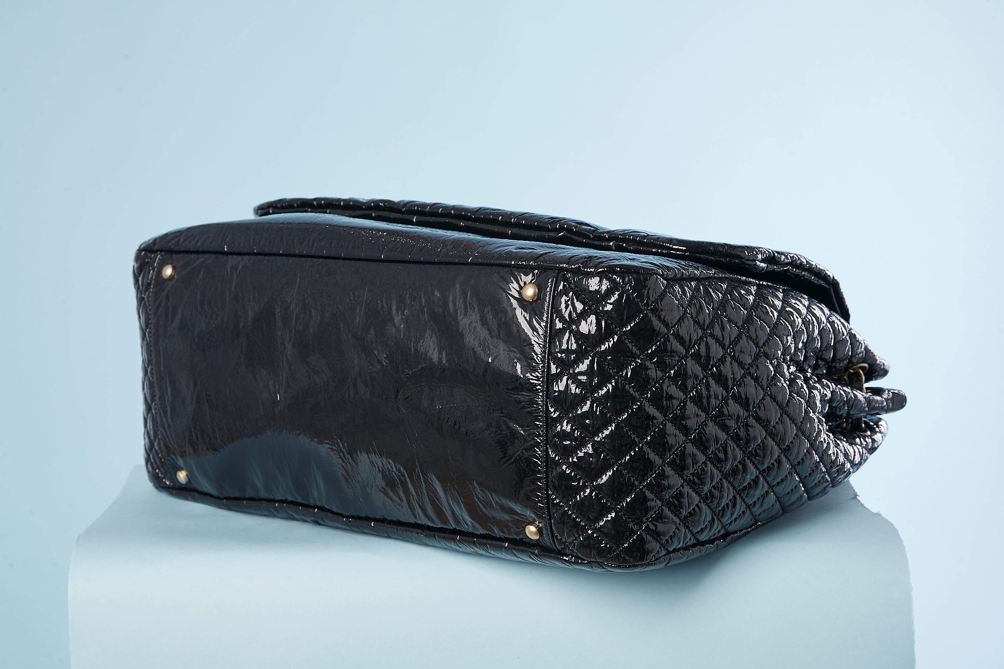 Black patent leather jumbo shoulder bag with Double C Chanel Numbered 2