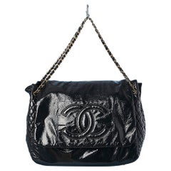 Black patent leather jumbo shoulder bag with Double C Chanel Numbered 