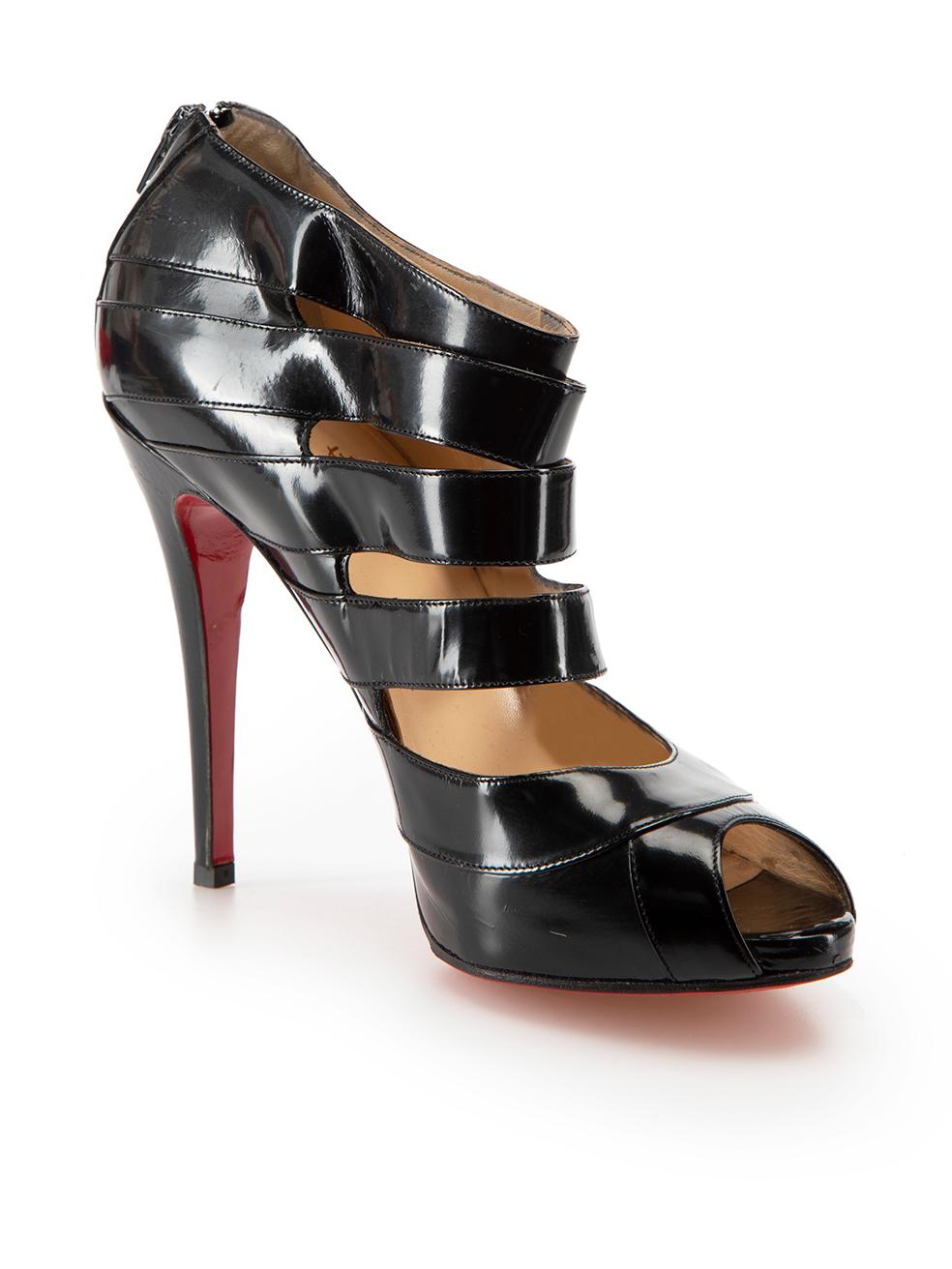 CONDITION is Good. General wear to heels is evident. Moderate signs of creasing to leather and scuff marks to heels and toe tips on this used Christian Louboutin designer resale item. Please note this item has been resoled and comes with