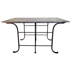 Black Patina Iron Table with Golden Hooves, circa 1900 
Dark Gray Marble Top