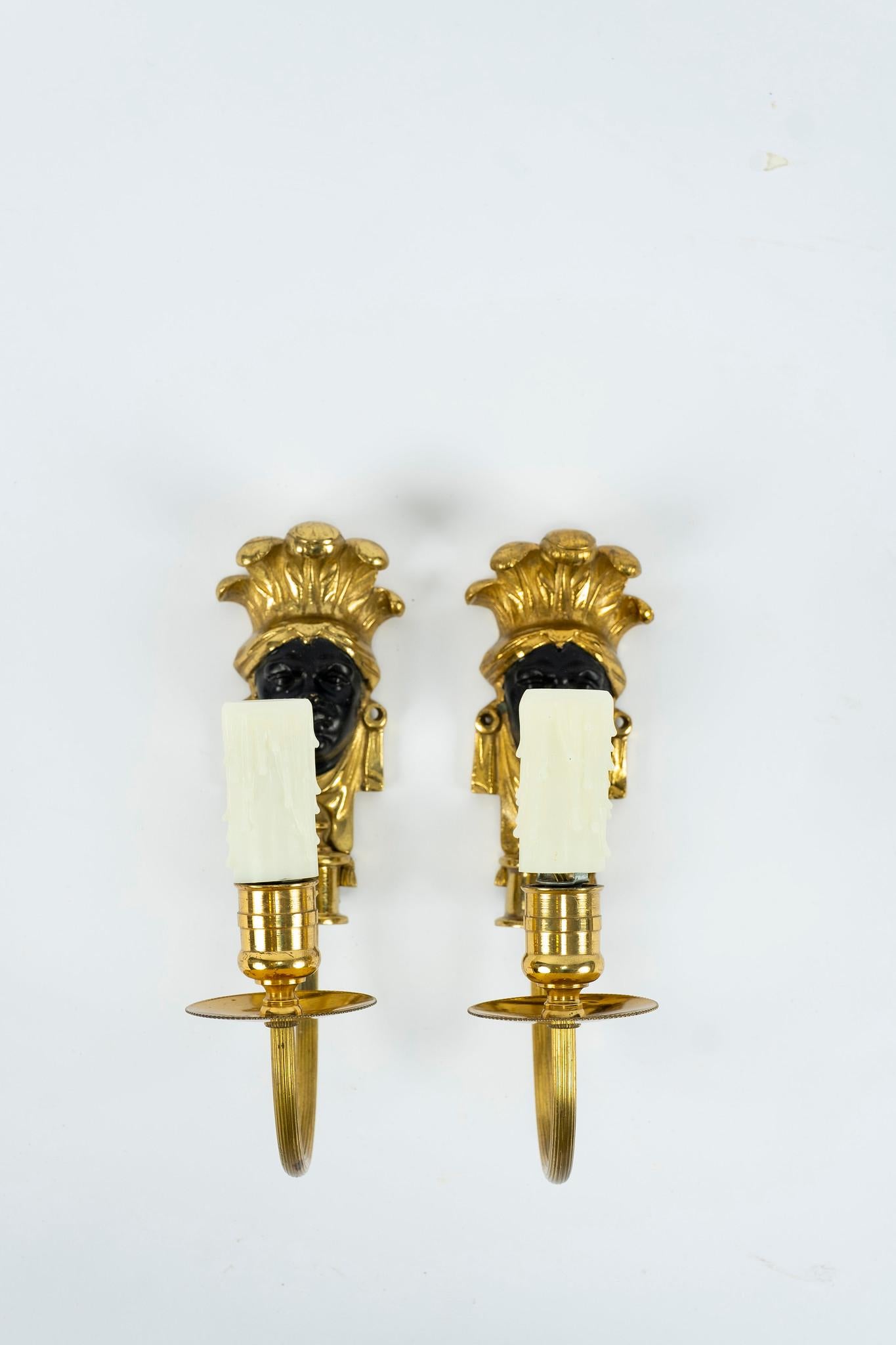 Neoclassical Revival Black Patinated and Bronze Face Sconces For Sale