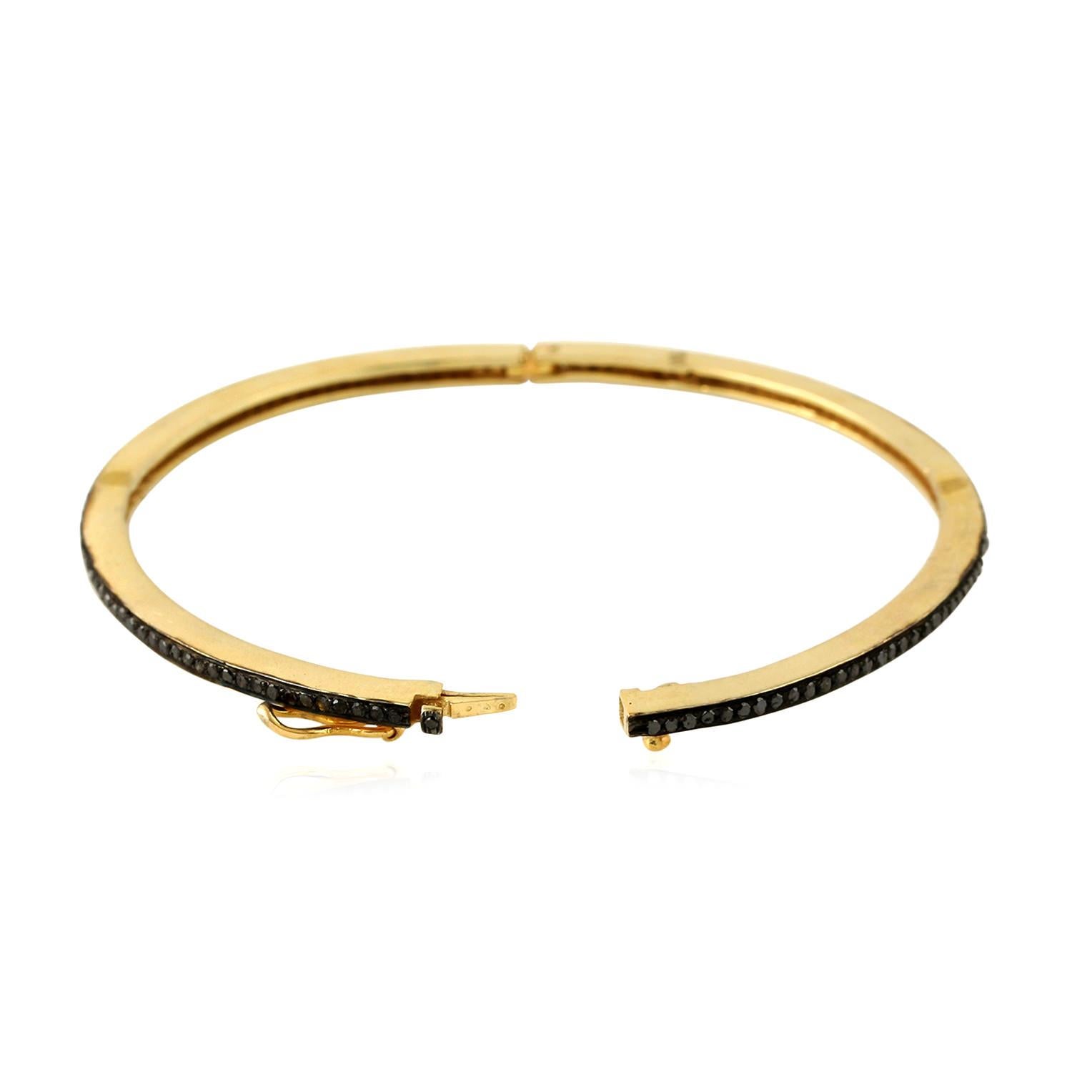 Artisan Bracelet jonc en or jaune 18 carats et argent pavé de diamants noirs