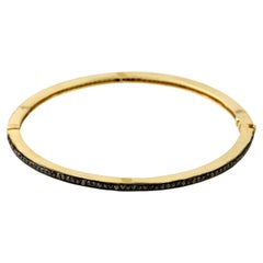 Bracelet jonc en or jaune 18 carats et argent pavé de diamants noirs