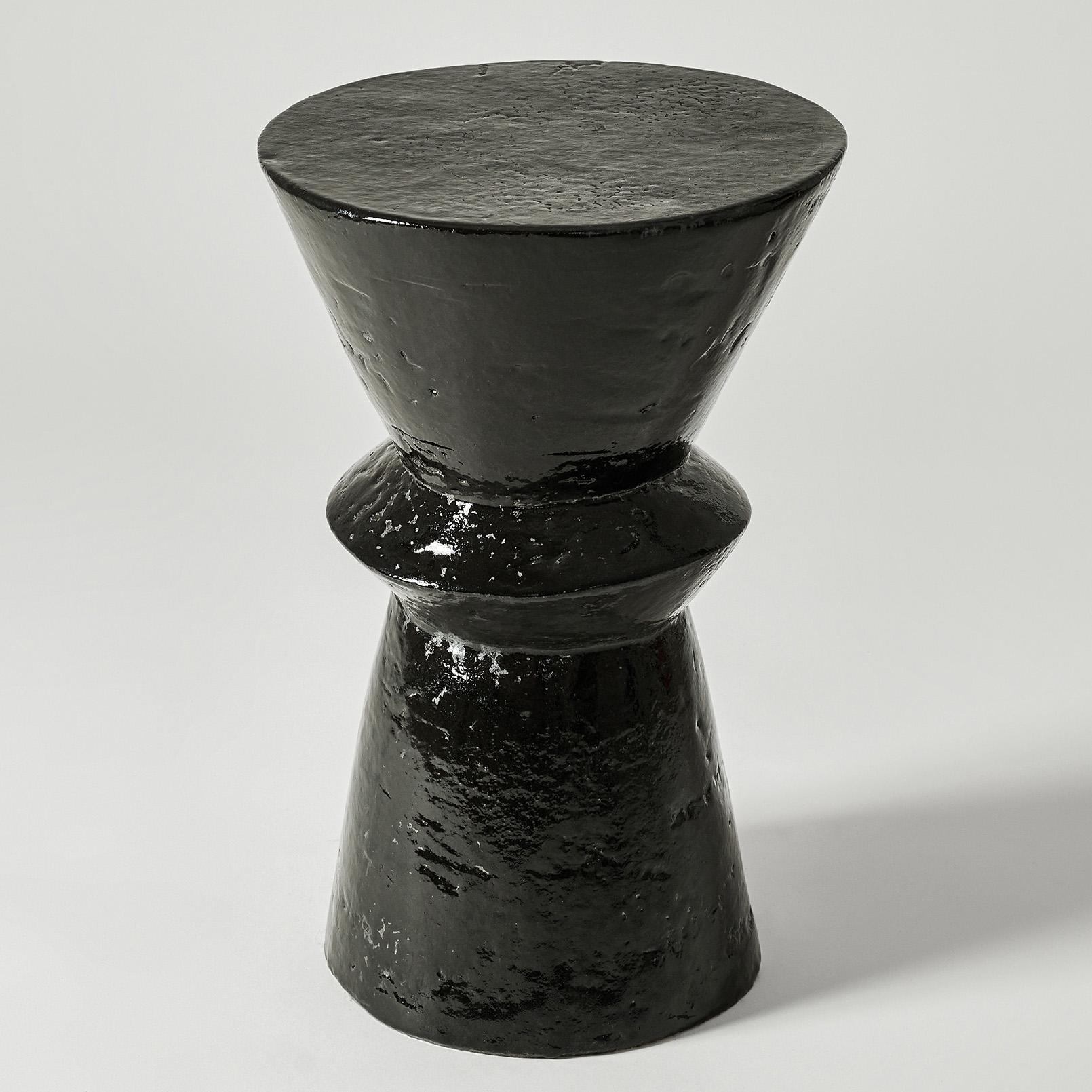 Black Pawn Side Table by Perler
Limited Edition
Dimensions: Ø 31 x H 48 cm.
Materials: Jesmonite.
Weight: 15 kg.

Black Pawn is a handmade ceramic table crafted by Polish artist Jakub Biewald. This versatile piece can be used as a coffee table, side