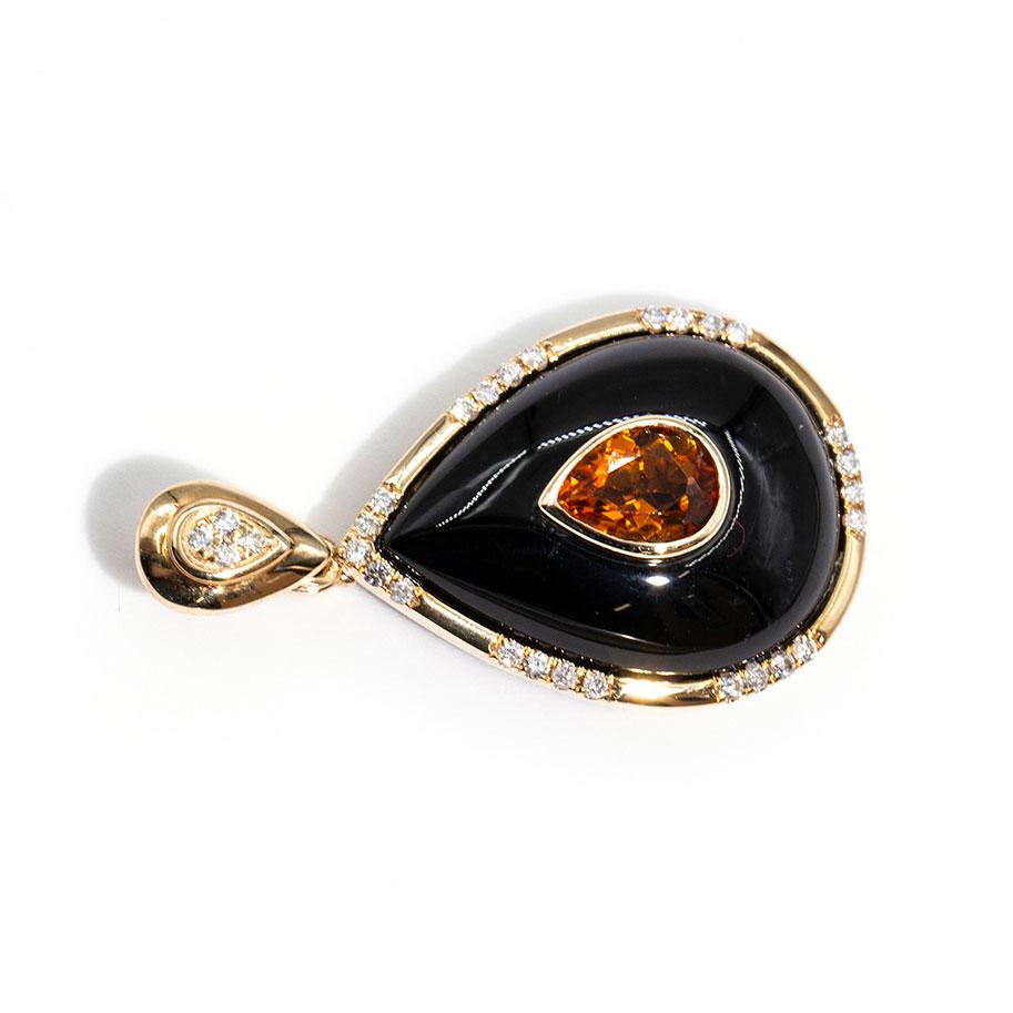 Carefully crafted in 9 carat yellow gold is this gorgeous art deco inspired black onyx, pear shape citrine and round diamond enhancer pendant. The spectacular shine of the pear shape onyx is perfectly complimented by the softness of the Citrine and