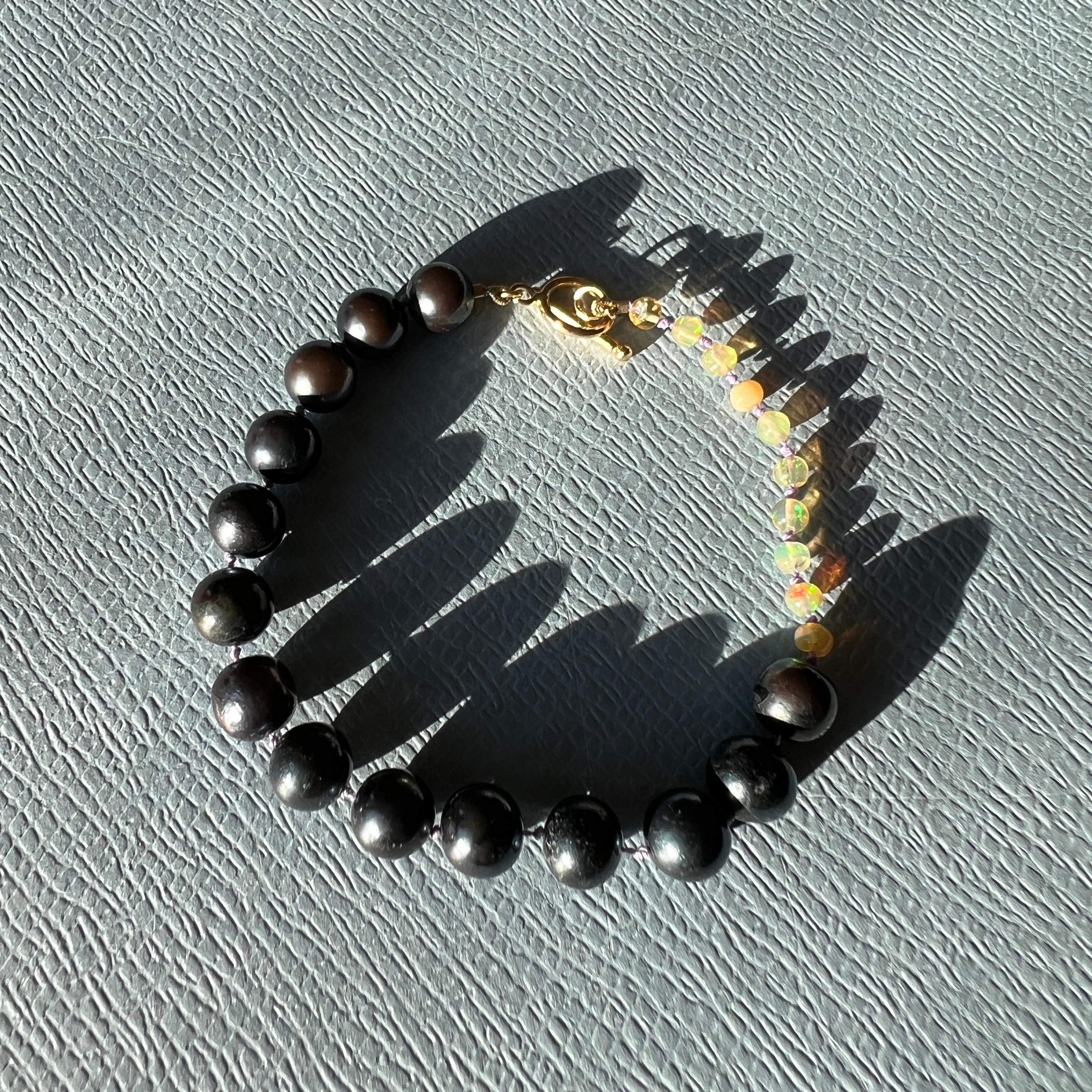 Black Pearl Bracelet Egyptian Opal

Egyptian Paline Opal and Sweet Water Black Pearl Bracelet 7