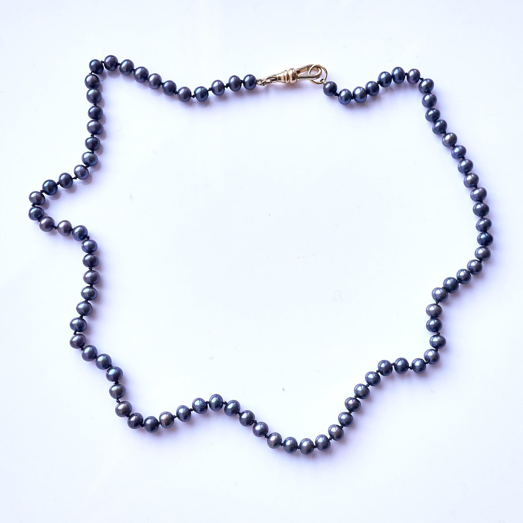 Collana di perle nere con filo di seta nero 18