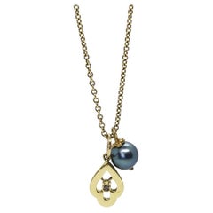 Black Pearl Necklace with 18K Gold Petal Cap and 14K Gold Geo Charm and Diamond