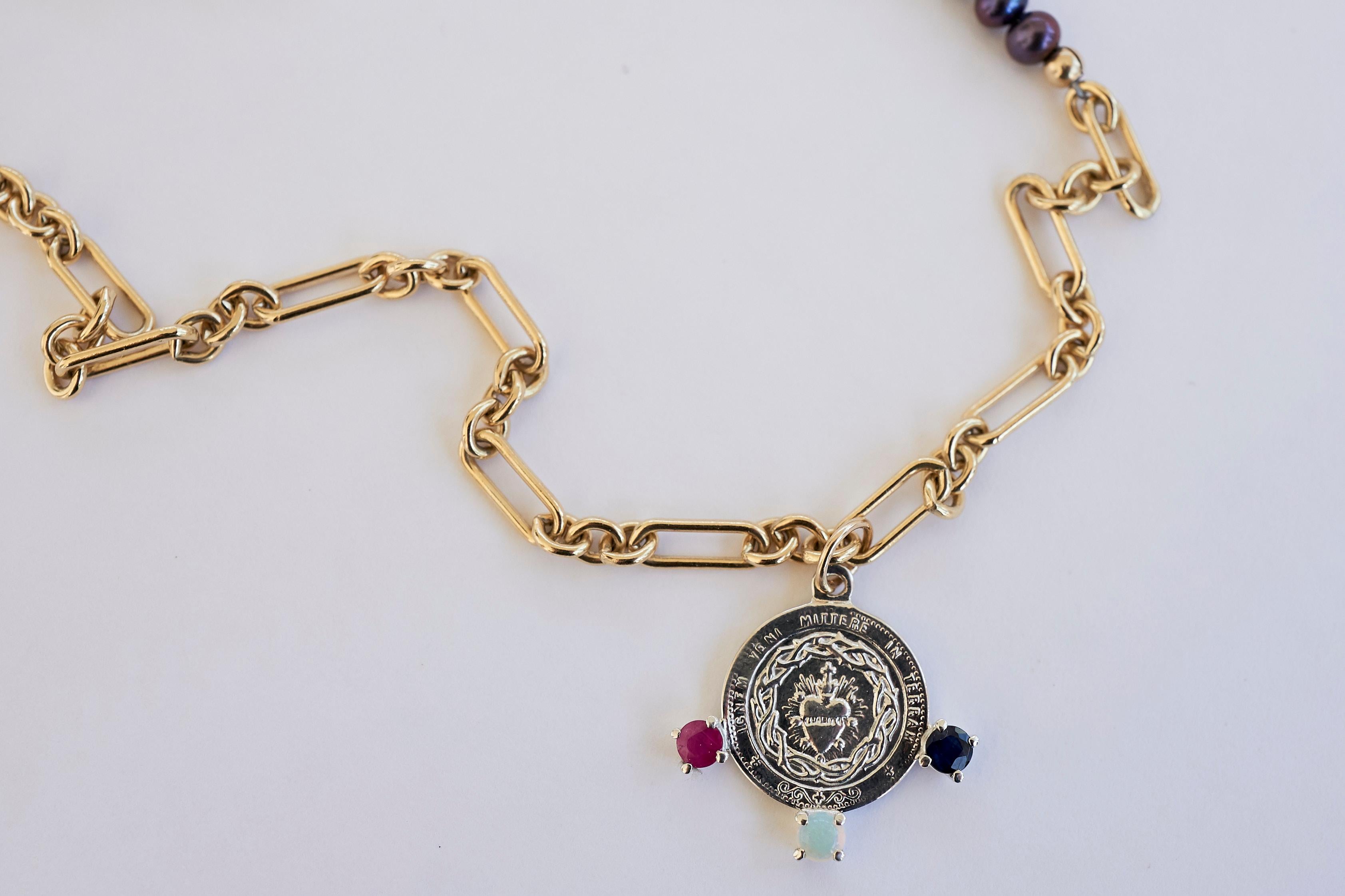 Victorien J Dauphin, collier de pièces avec médaille du Sacré-Cœur, perle noire, opale, tourmaline rose en vente
