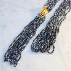 Black Pearl Tassel Lavalier Necklace, 9 Karat Yellow Gold Palm Frond Detail