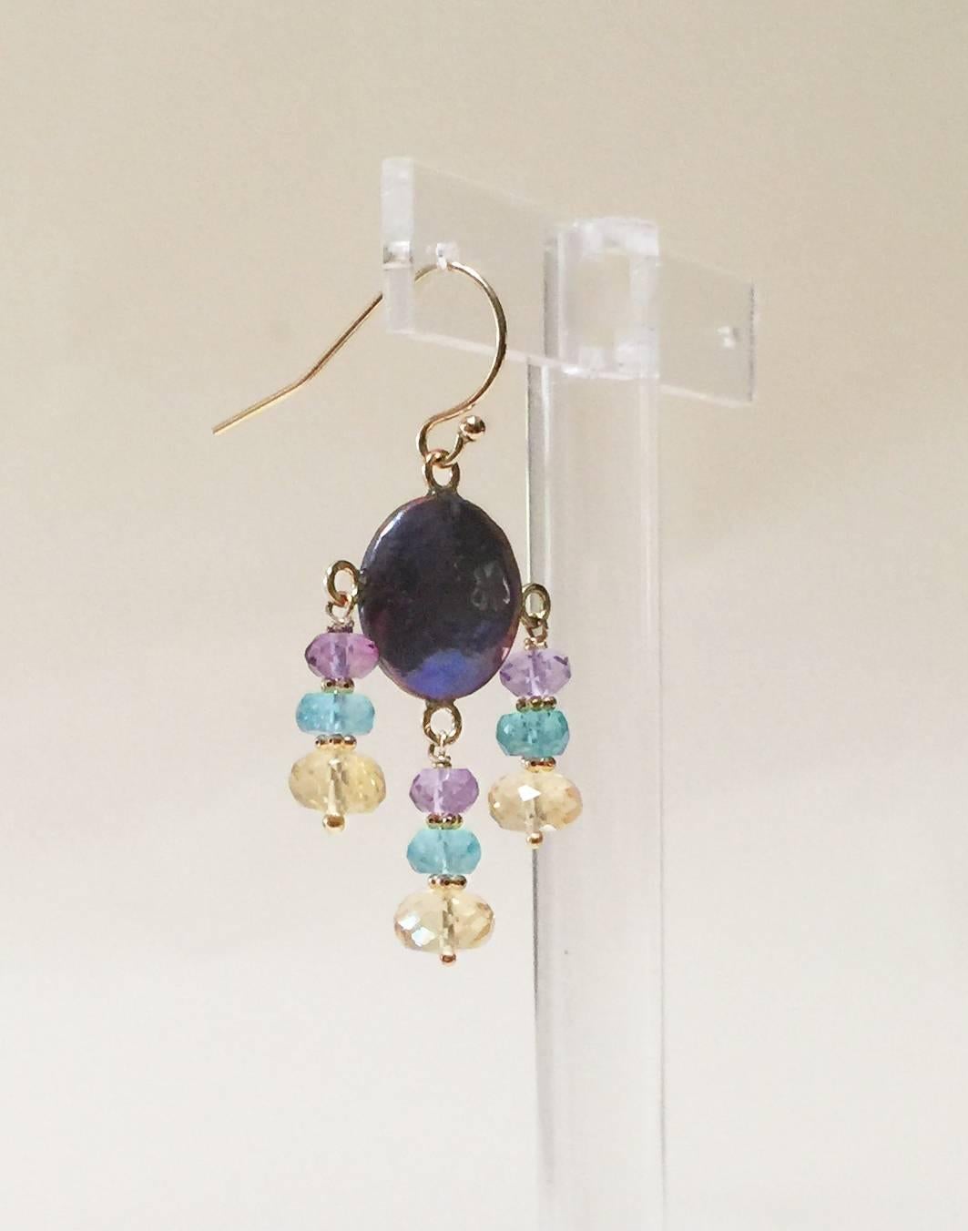 The black pearl is the centerpiece of these delicate and detailed earrings (1.6 inches). The pastel colors of the amethyst, blue topaz, and citrine beads are bright and whimsical.  Small 14 k yellow gold beads subtly connect the stones perfectly.