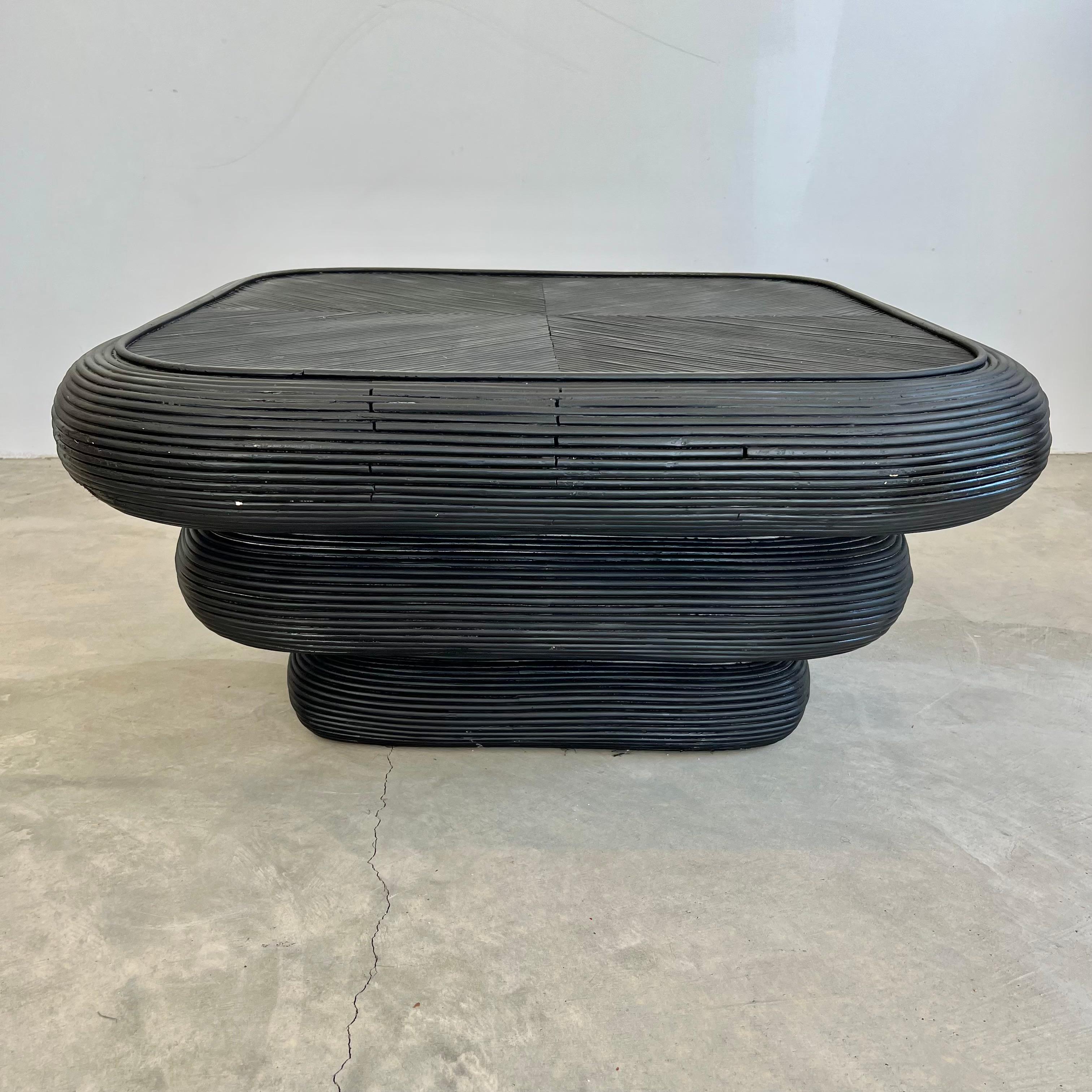 Vintage 3 tiered pencil reed coffee table in black. This elegant table features an organic and modern rounded shape consisting of three levels, each a different size. Great lines and design. Matte black finish. Good vintage condition. Great