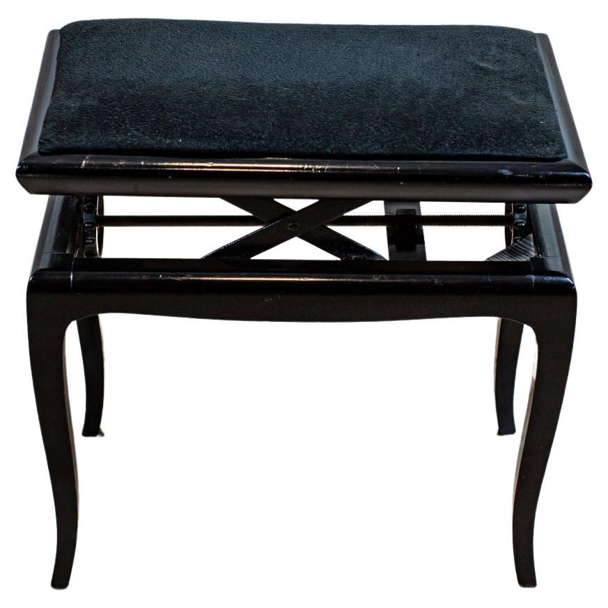 Black Piano Stool From the Early 20th Century with Upholstered Seat