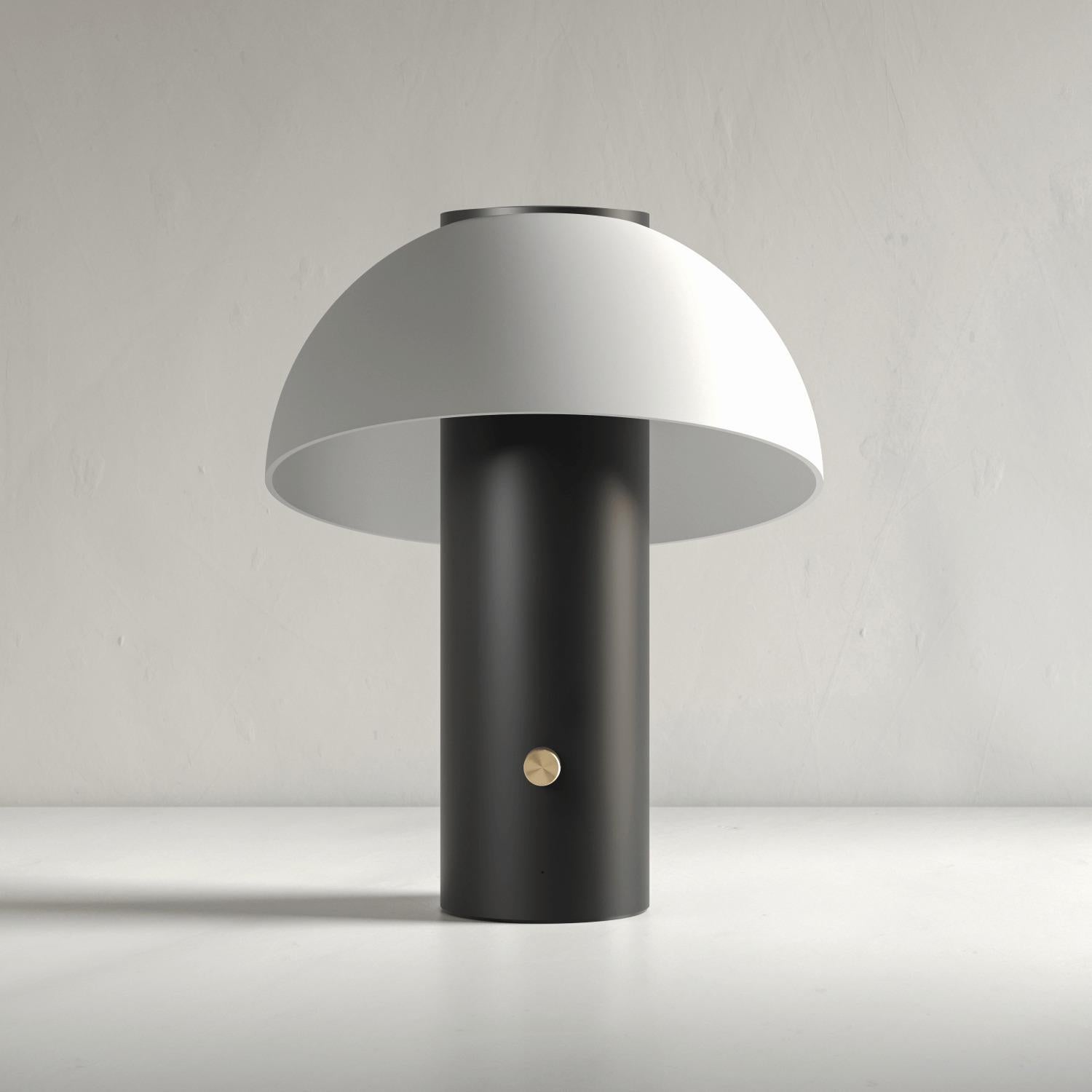 Black Piccolo Lamp by JAUNE STUDIO
Dimensions: D 23 x H 30 cm
Materials: Aluminum body, brass rotative knobs, lacquered painting. Opal hand blown glass lampshade. 

Lighting : Variable LED lighting 1800 to 2700K - 0 to 1000 lm
Connectivity : WiFi,