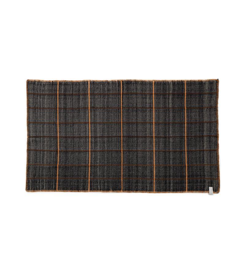 Black plaid manta by Sebastian Herkner
Materials: 100% natural virgin wool. 
Technique: hand-woven in Colombia. 
Dimensions: W 200 x H 120 cm 
Available in colors: blue/ black/ rose, black/ white/ ochre, grey/ rose/ blue, green/ blue/ naranja.