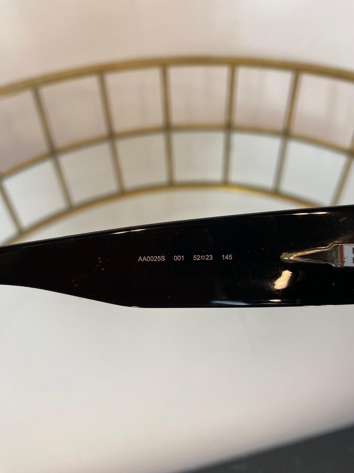 Black plastic sunglasses with studs For Sale 1