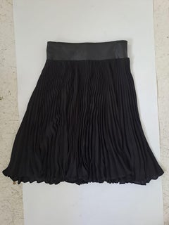 Black pleated skirt by Diane Von Furstenberg with a faux leather belt