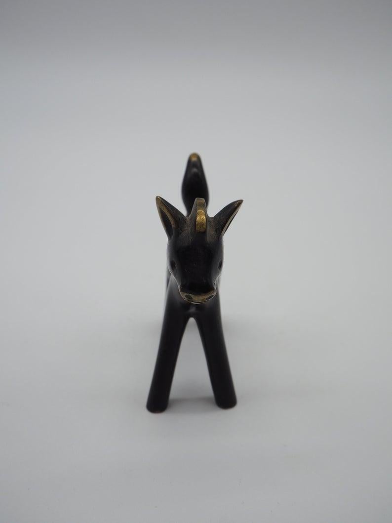 A small black pony in the style of Walter Bosse/Herta Baller made of brass.