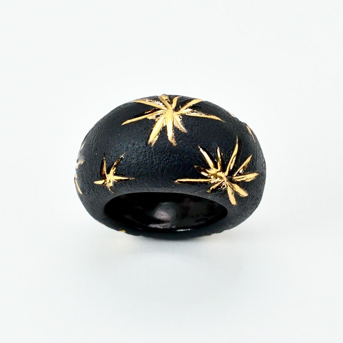 Contemporary Black Porcelain Ring with Golden Stars