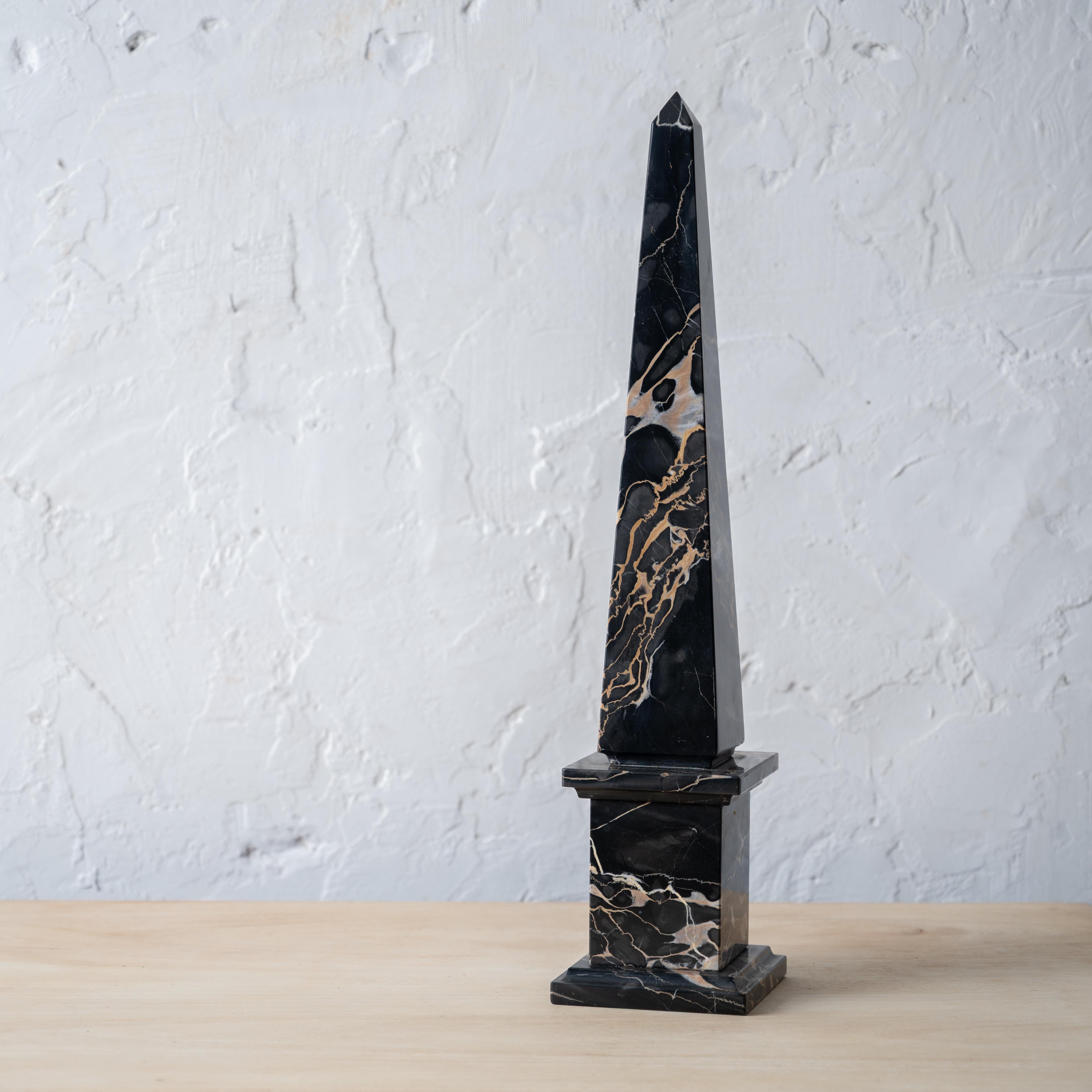 A black portoro Italian marble obelisk, 20th century.



4 ¼ inches wide by 19 ¾ inches tall



