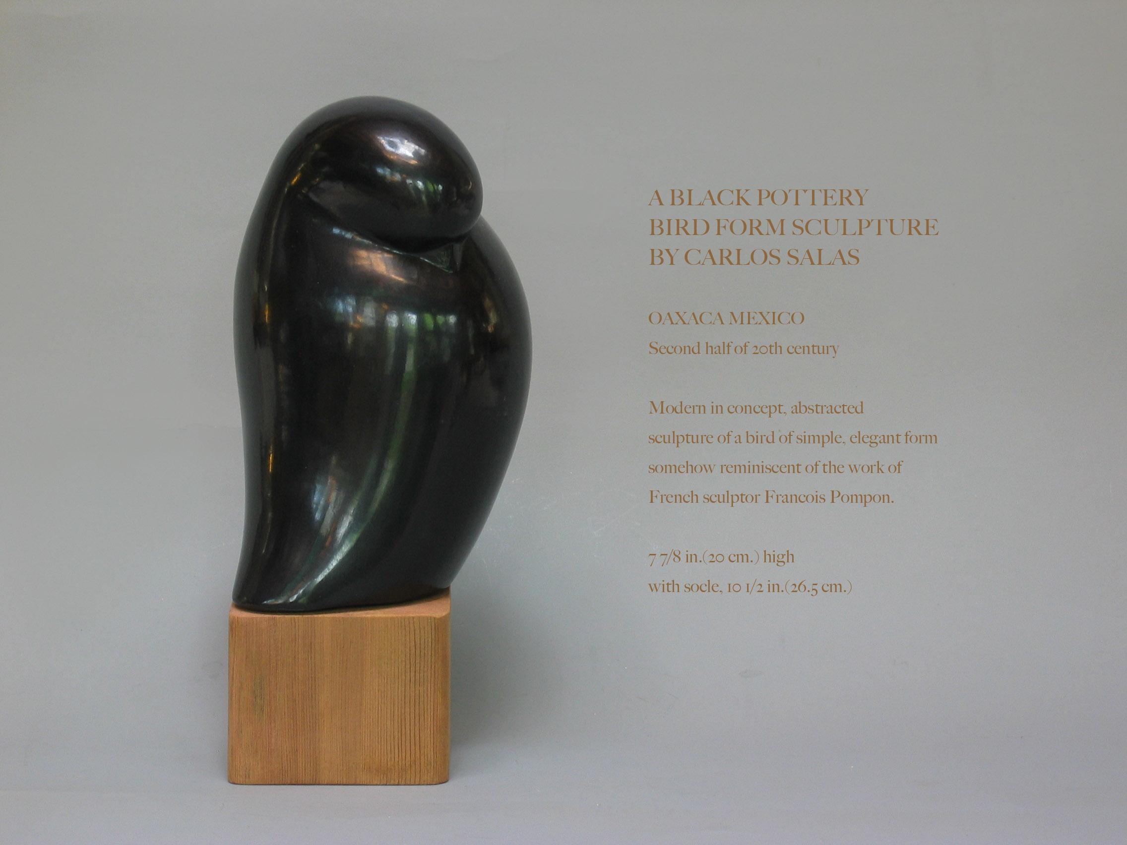 A black pottery bird form sculpture
By Carlos Salas

Oaxaca Mexico
Second half of 20th century.

Modern in concept, abstracted
sculpture of a bird of simple, elegant form
somehow reminiscent of the work of
French sculptor Francois