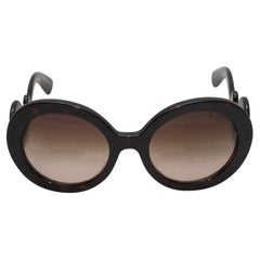 Gafas de sol Prada Baroque Round Swirl Negras