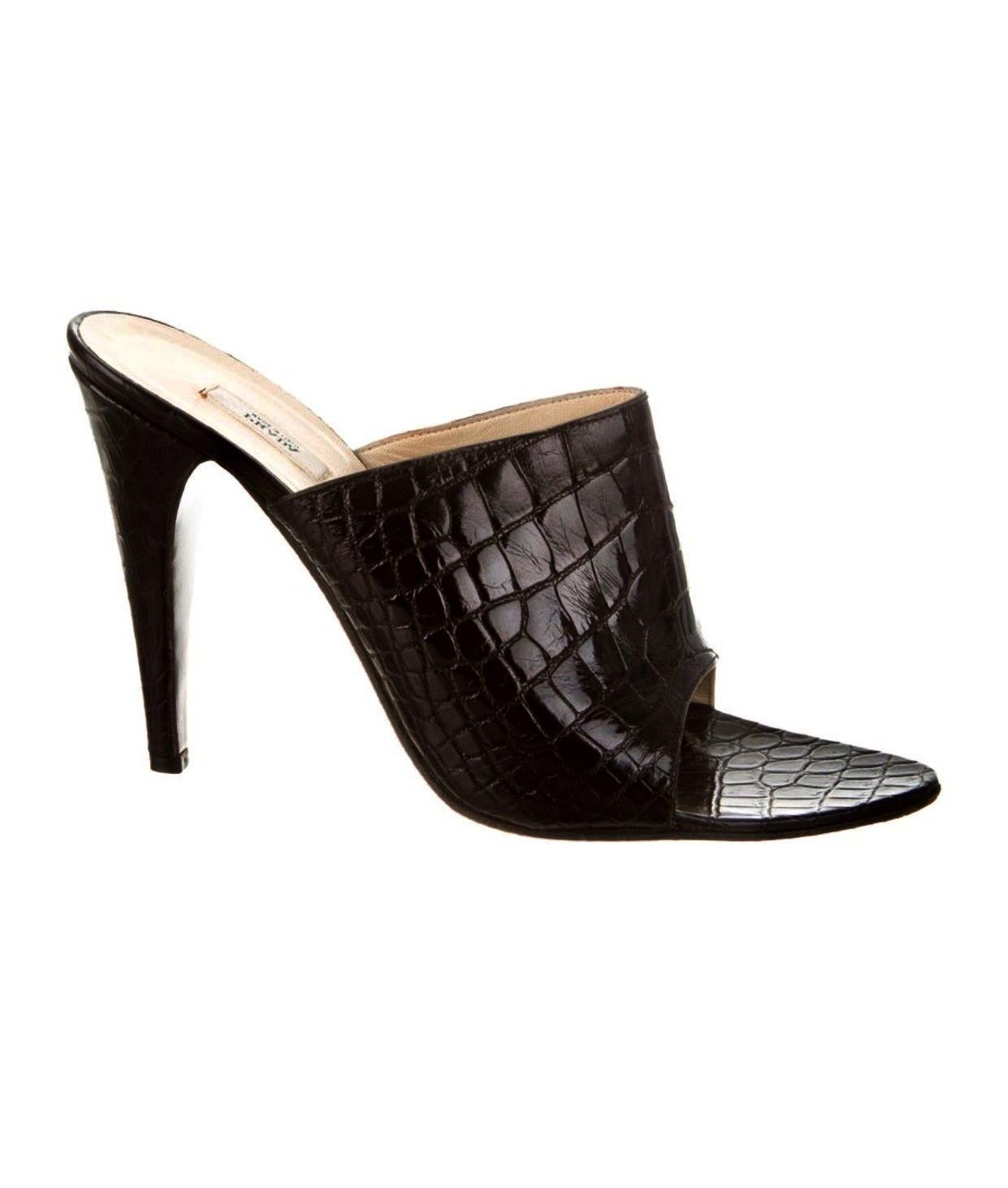 Beautiful Prada High Heel Sandals
Real crocodile skin in black color - no print
From Prada's exotic skin collection
Classic style
Made in Italy
Size 39 EU
Comes with Prada dustbag
Retailed for 2999$
